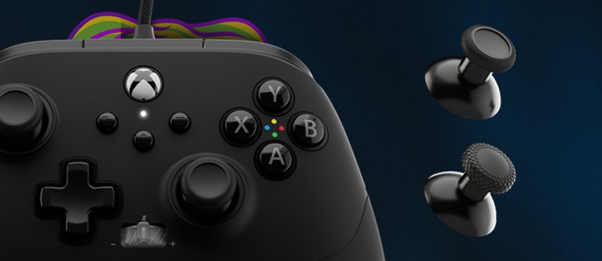 Detail of controller's default thumbsticks and swappable tall thumbsticks